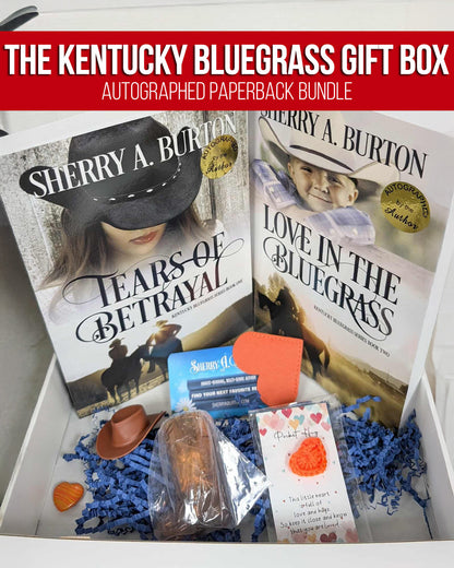 Image of the Kentucky Bluegrass gift box, including the two books in the series, plus bonus swag